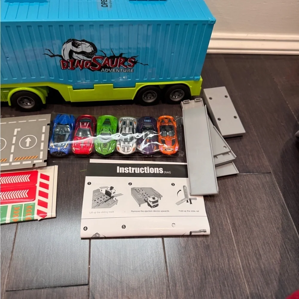 NWOT Dinosaur Adventure EXTENDABLE 47in Transport Truck TRACK - 6 Cars Included